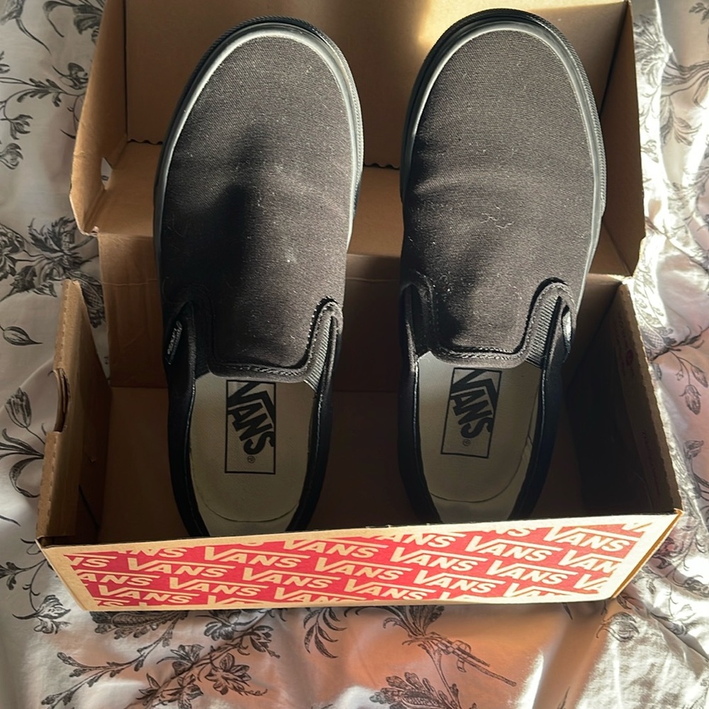 Hardly worn slip on black vans with original box
